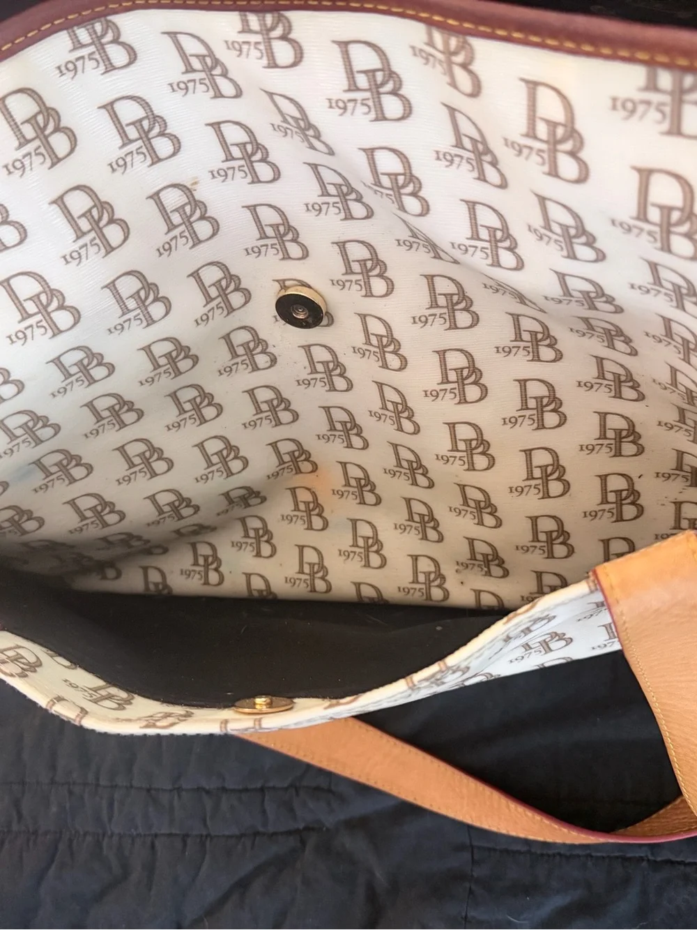 Dooney & Burke Monogram Leather Baby Bag in Cream and Tan